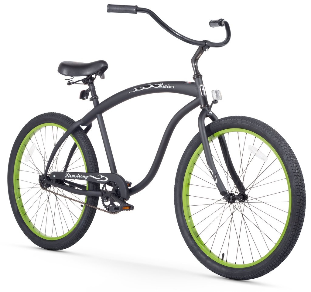 Charcoal grey beach cruiser bicycle for rent on a white background.