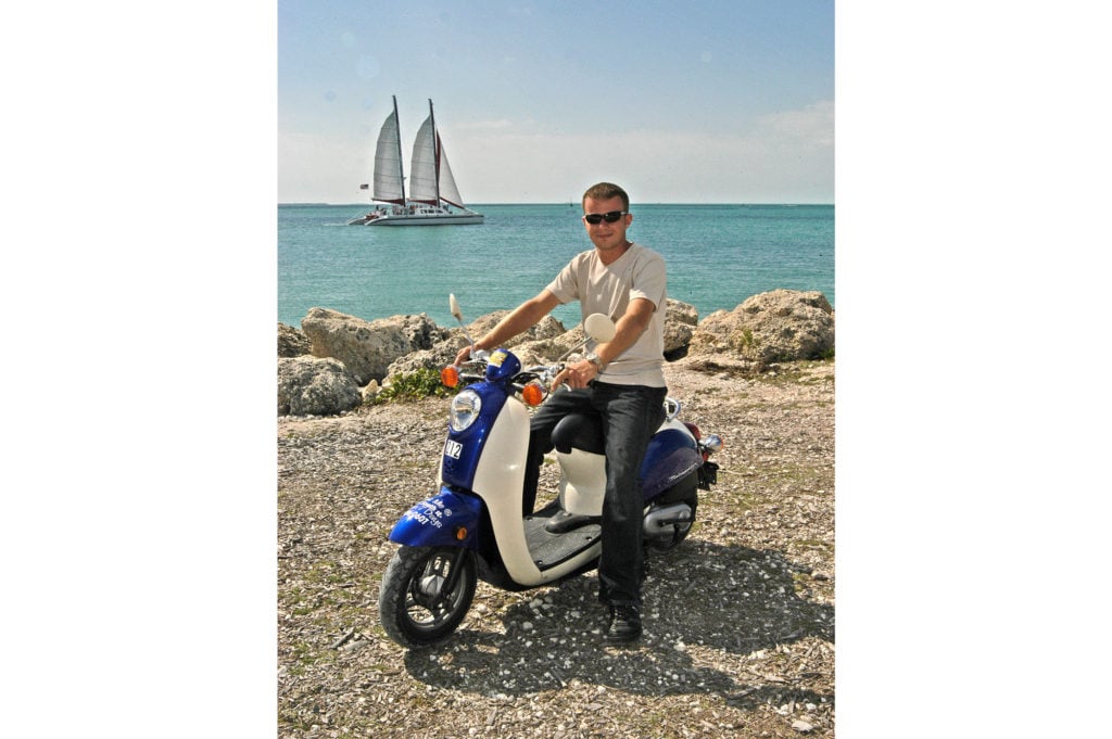 First-time rider renting a scooter in Key West and stopping by the waterfront